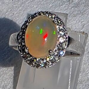 Glorious Estate Genuine Ethiopian Welo Opal And White Topaz Halo Ring